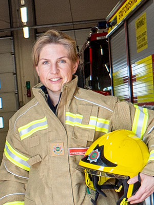 Fire fighter smiling for the camera