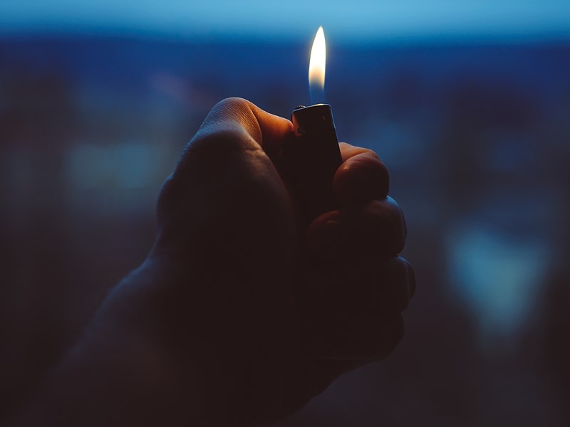 Holding a lighter