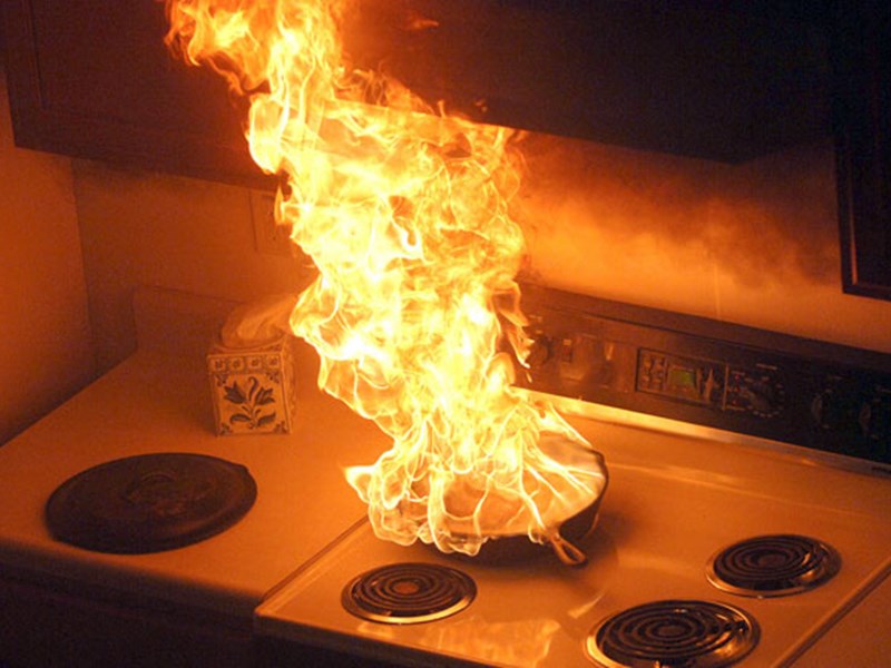 Hob on fire in kitchen
