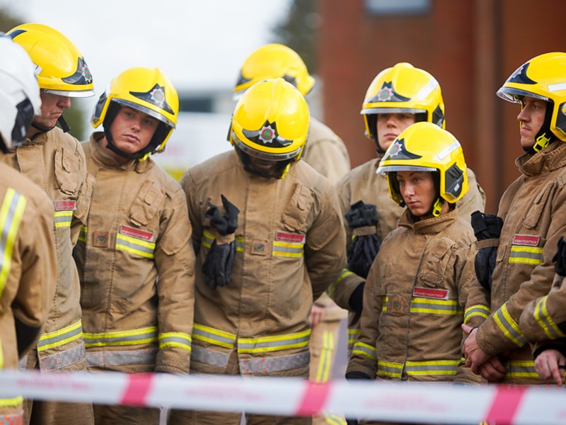 Firefighters listening to instructions