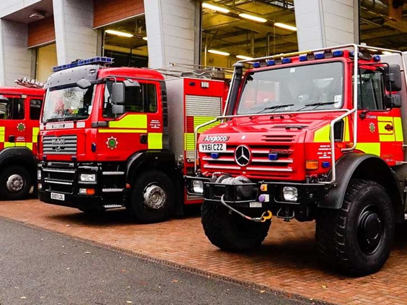 Service vehicles lined up outside appliance bay