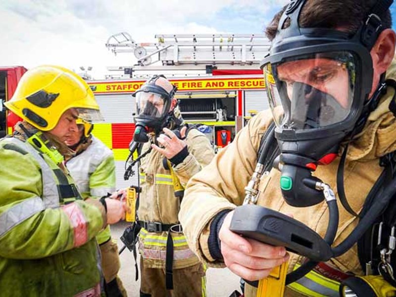 Firefighters in breathing apparatus