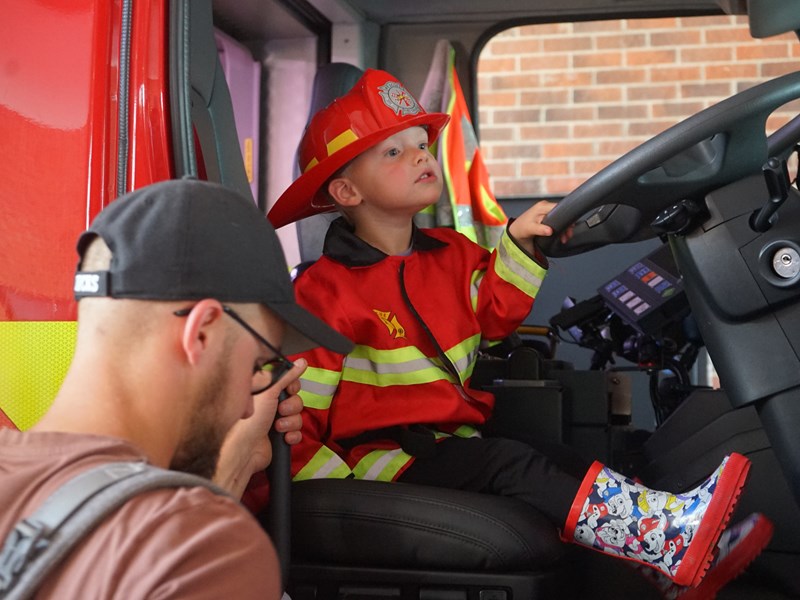 Boy in fire appliance