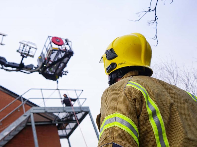 Firefighter standing in front of ALP